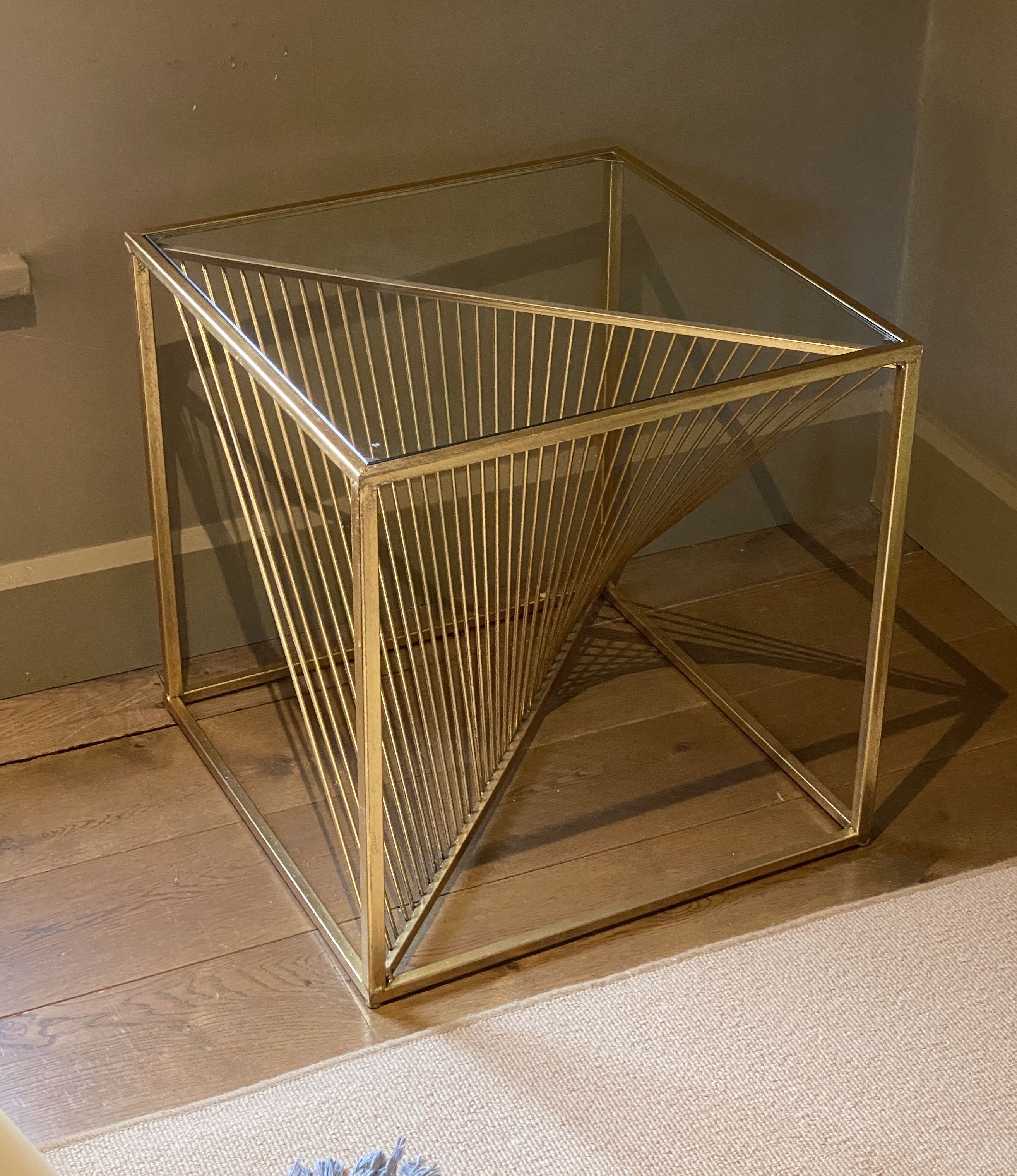 A pair of gold painted metal glass top occasional tables, with wirework underframes, width 52cm depth 52cm height 53cm